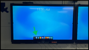 Photo of the left ActivPanel with the pop-up window displaying apps. The arrow is pointing to the first app with text "Locker" underneath it.